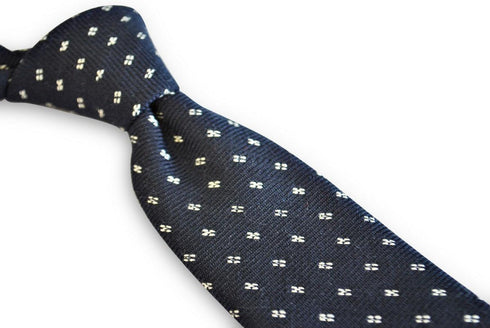 navy tie with white squared polka dot design